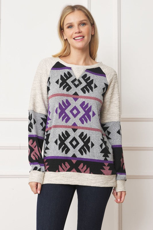 V Stitch tribal-inspired tunic with contrasting details