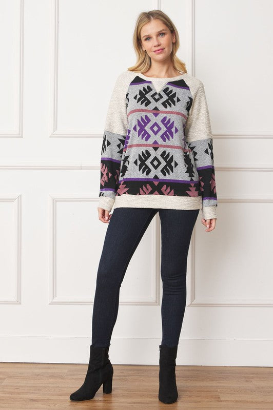 V Stitch tribal-inspired tunic with contrasting details