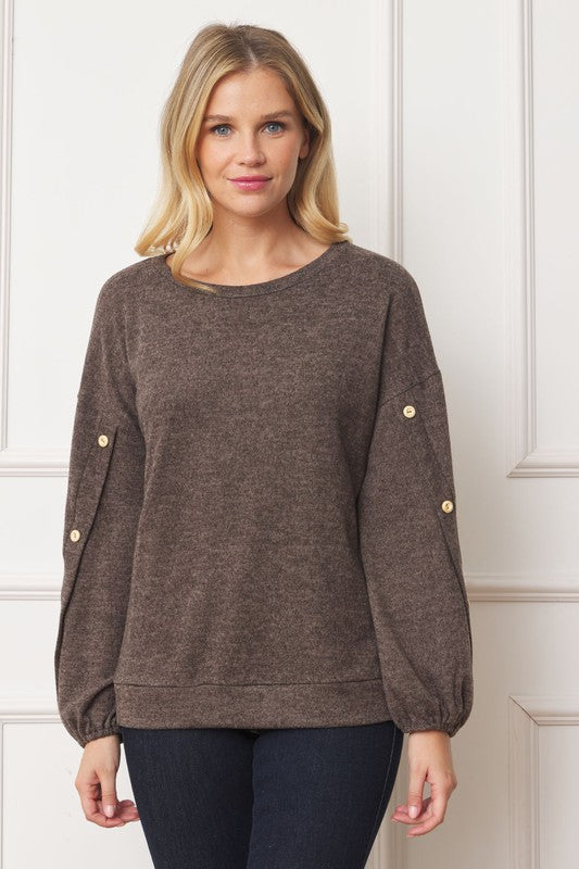 Stylish drop shoulder top with button sleeve accents