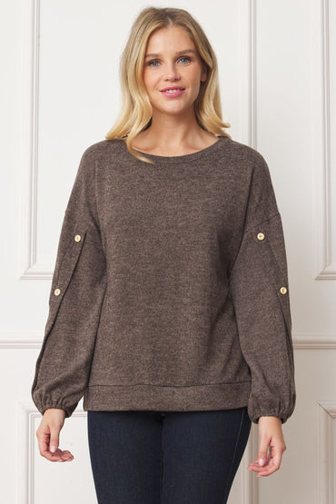 Stylish drop shoulder top with button sleeve accents