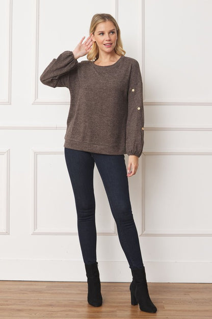 Stylish drop shoulder top with button sleeve accents