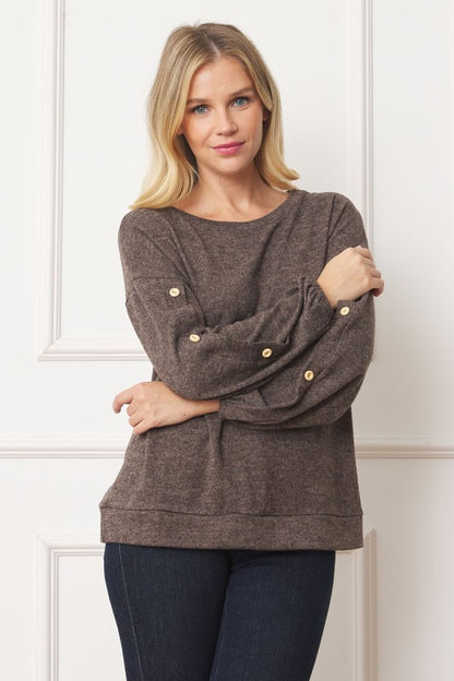 Stylish drop shoulder top with button sleeve accents