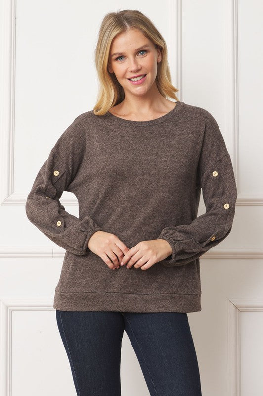 Stylish drop shoulder top with button sleeve accents