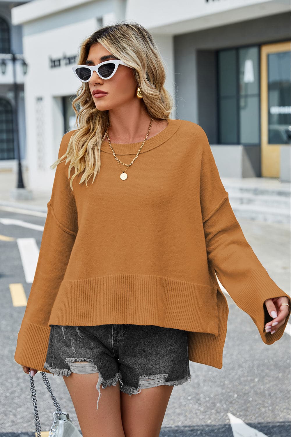 Round Neck Dropped Shoulder Slit Sweater.