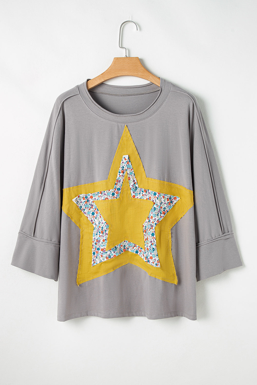 Chic medium grey floral star patch top with 3/4 sleeves in plus sizes