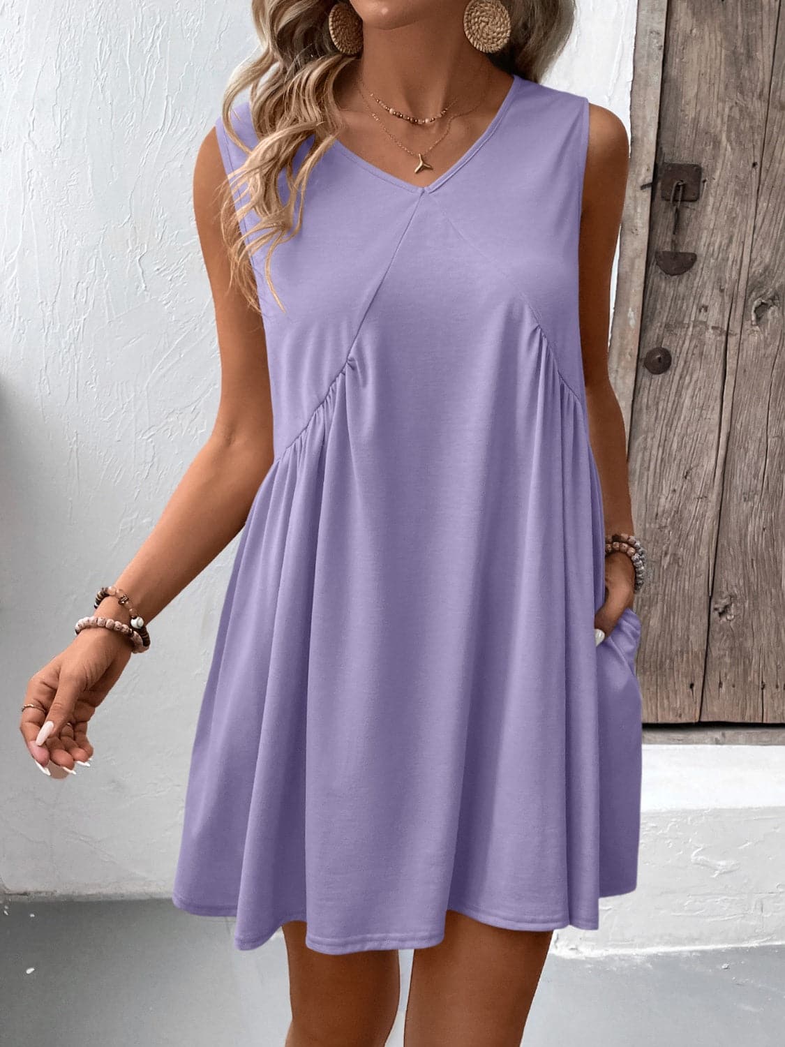 Ruched V-Neck Sleeveless Mini Dress.