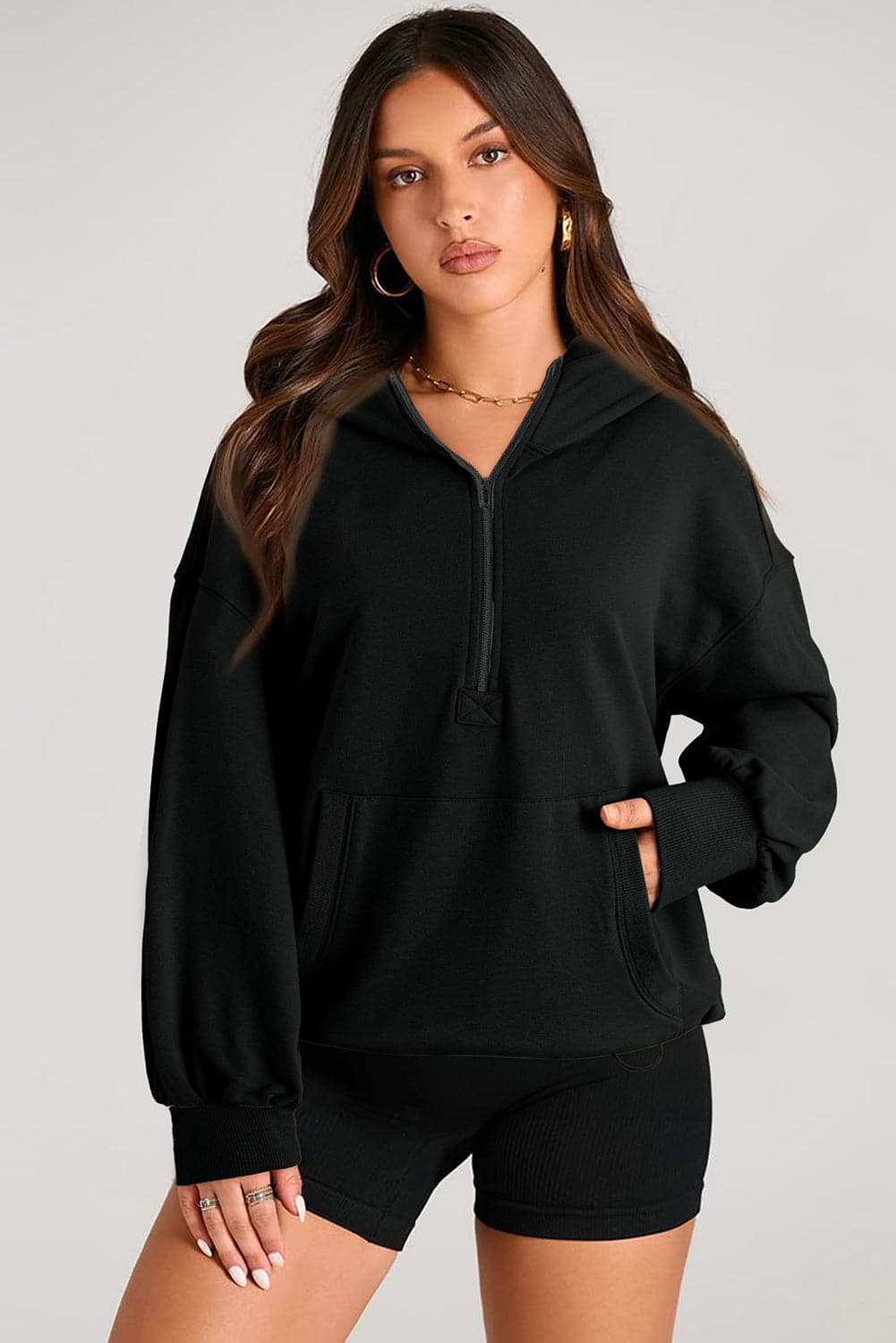 Sheer pocketed half zip hoodie for a stylish look