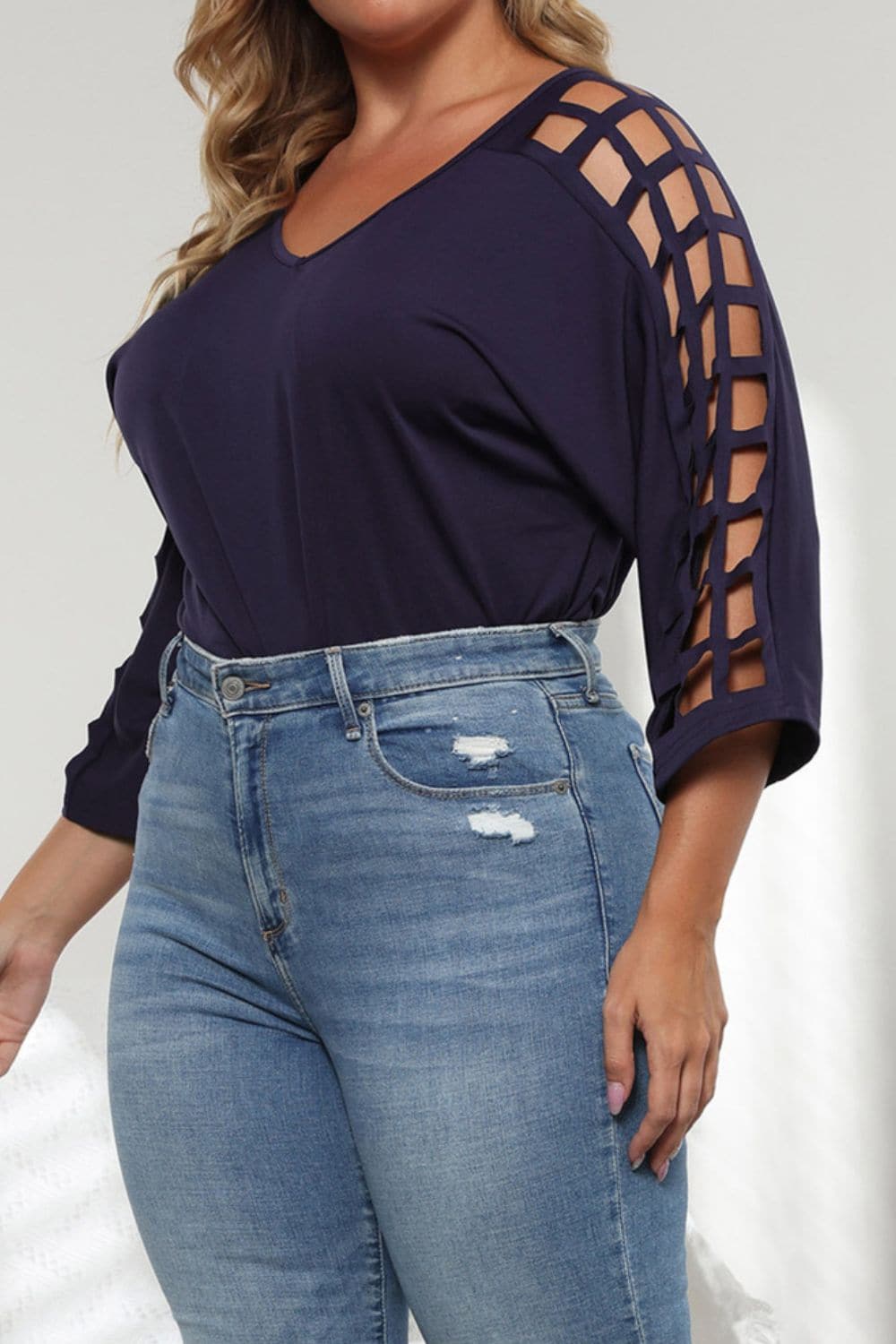 Plus Size Cutout Three-Quarter Sleeve Blouse.