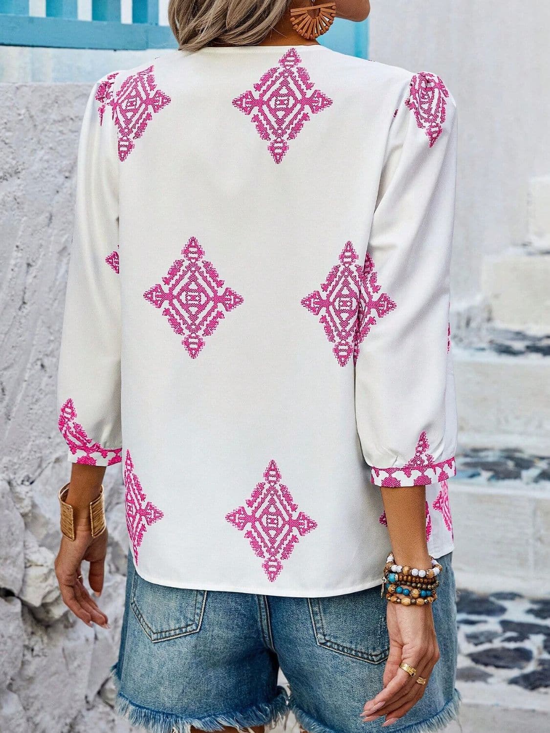 Printed V-Neck Three-Quarter Sleeve Blouse.