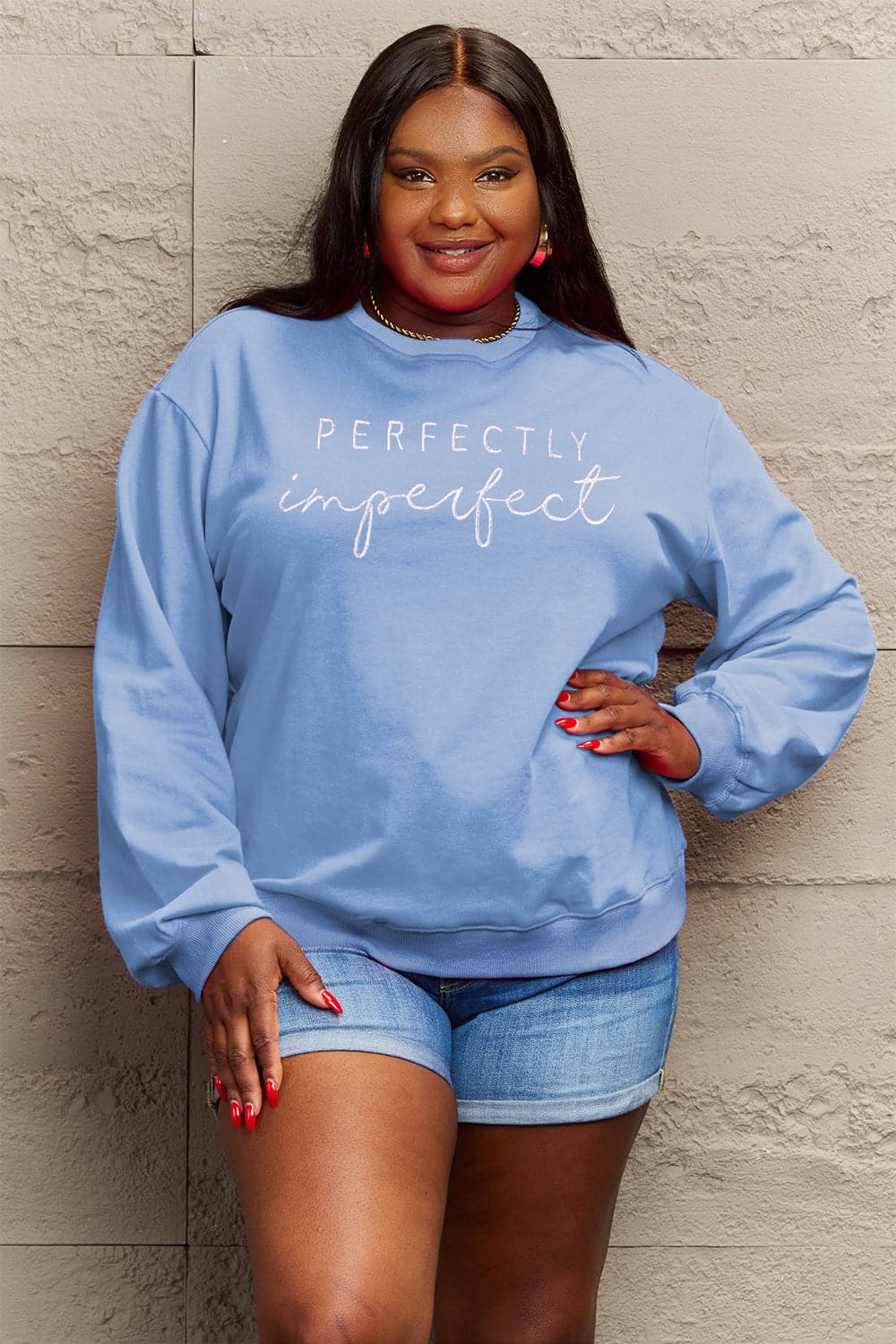 Simply Love Full Size Graphic Round Neck Sweatshirt.