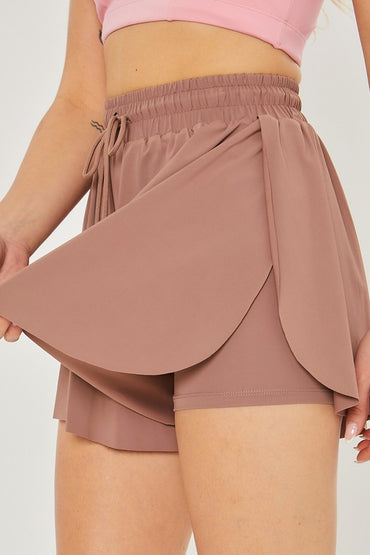 Versatile activewear shorts with built-in compression liner