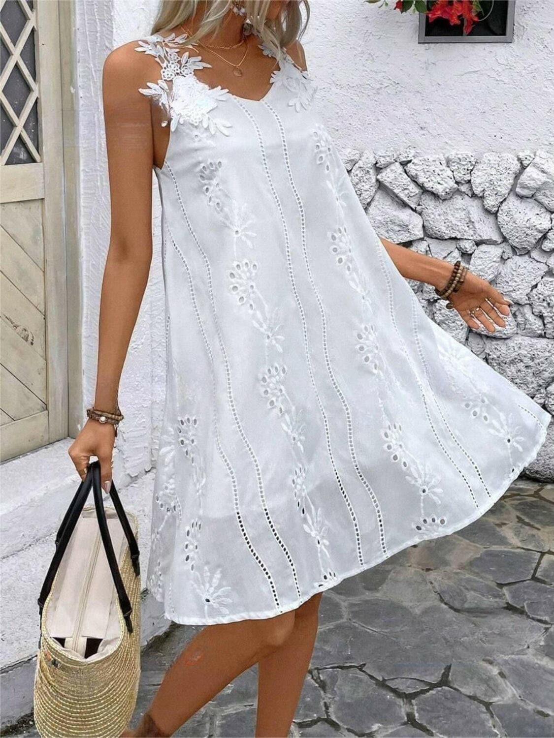 Lace Detail V-Neck Mini DressUpgrade Your Style with our Lace Detail V-Neck Mini Dress
 Indulge in elegance and charm with our Lace Detail V-Neck Mini Dress. This exquisite piece features delicaLove Salve -Neck Mini Dressswimwear