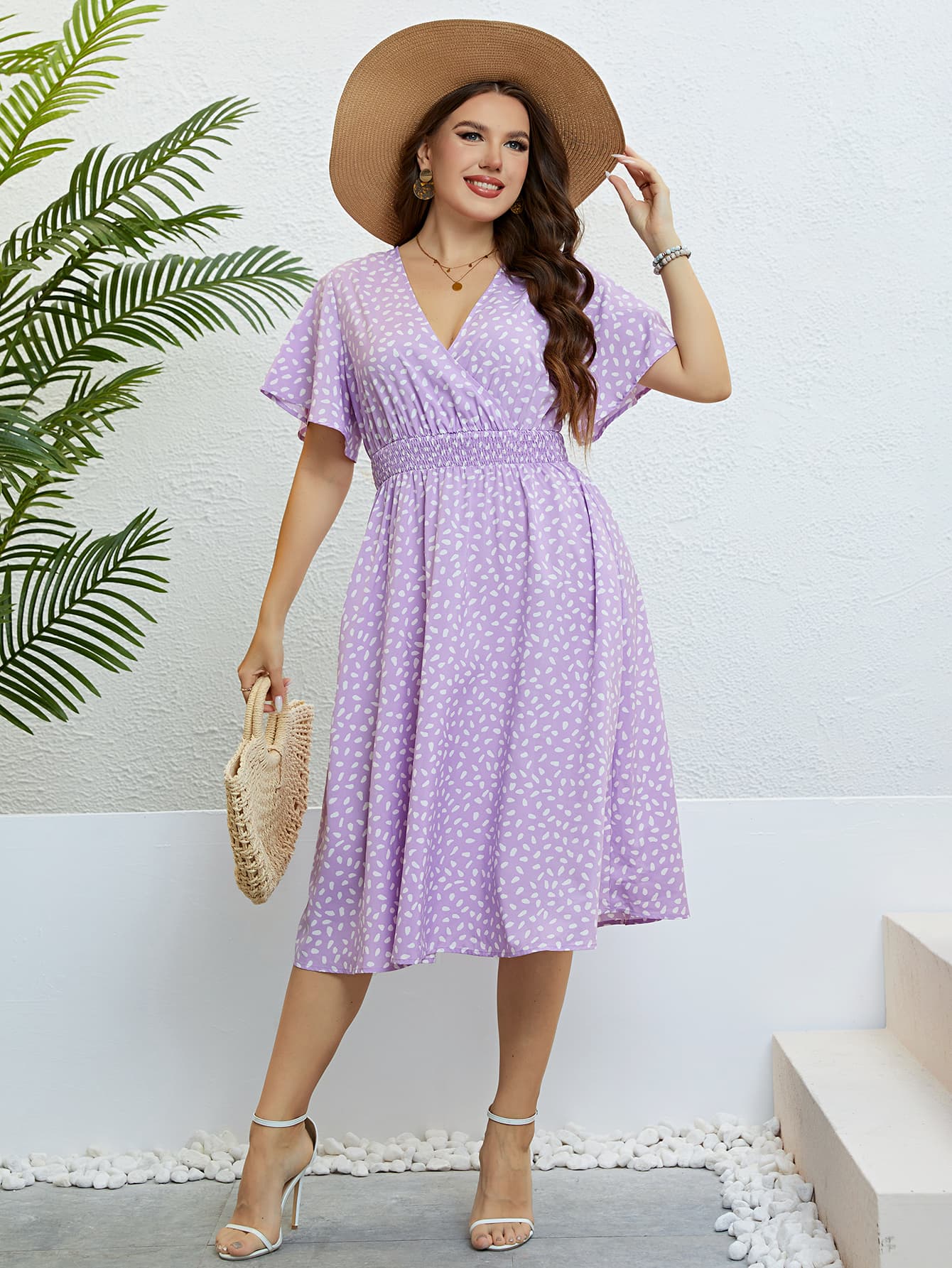 Plus Size Printed Smocked Waist Surplice Dress.