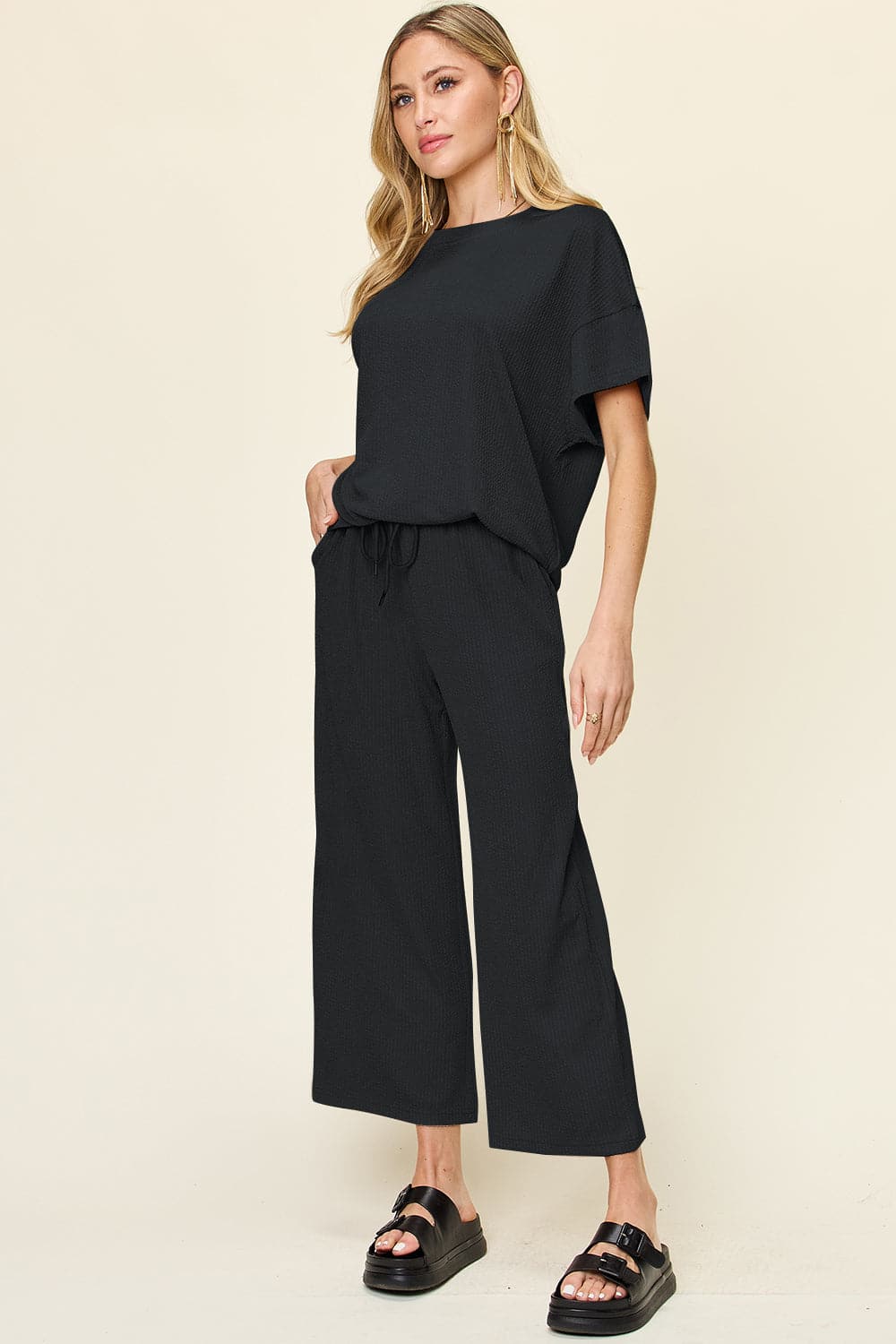 Double Take Full Size Texture Round Neck Short Sleeve T-Shirt and Wide Leg Pants.