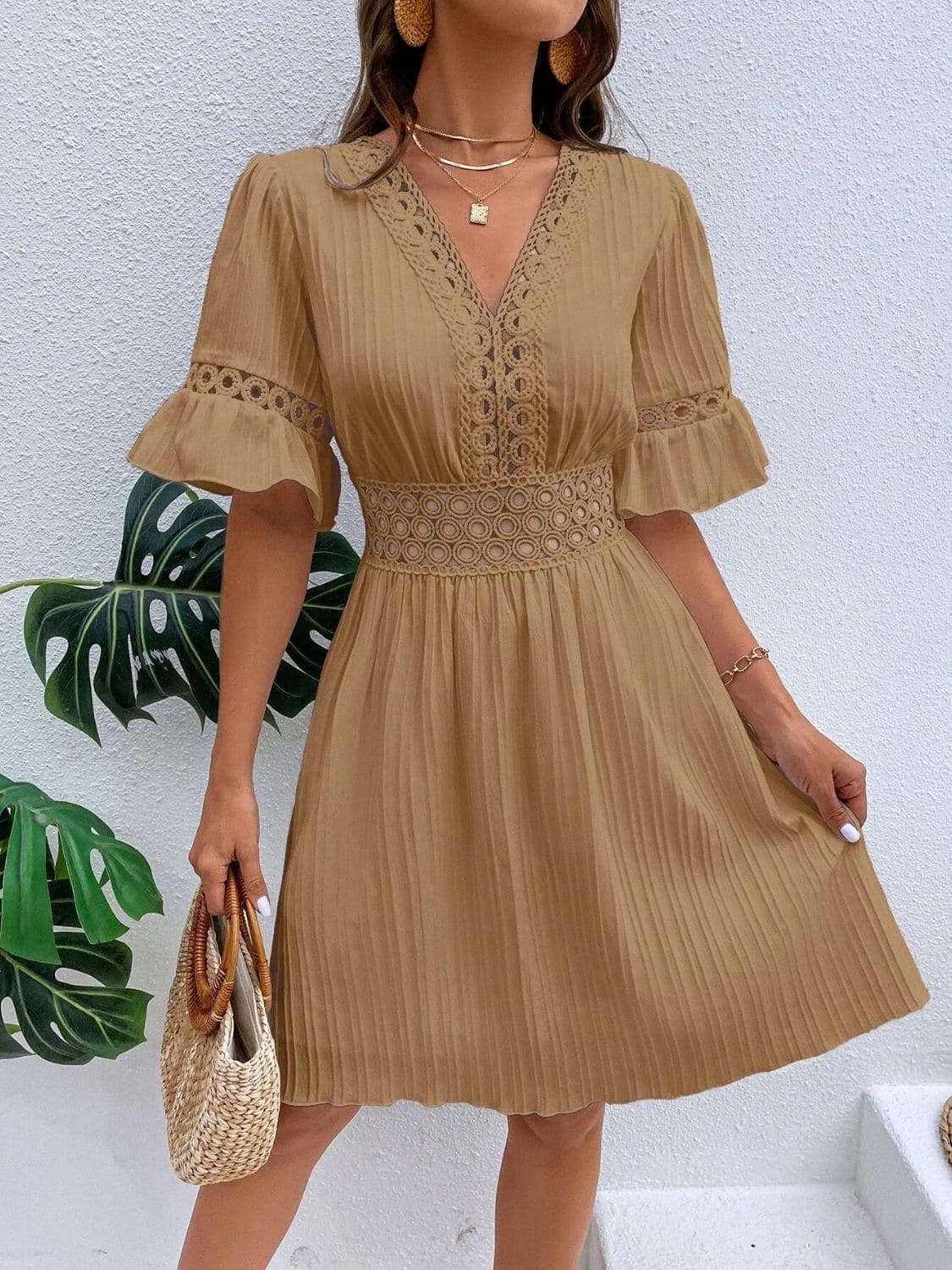 Cutout V-Neck Flounce Sleeve Mini Dress.