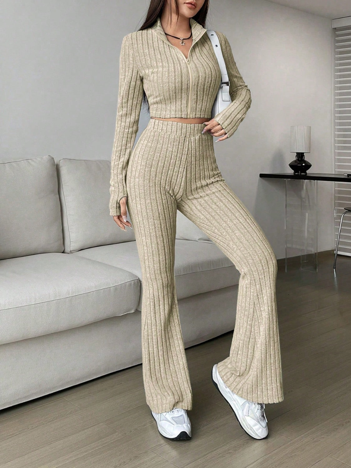 Zip Up Long Sleeve Top and Pants SetFeatures: Basic style
Number of pieces: Two-piece
Stretch: Slightly stretchy
Material composition: 95% polyester, 5% elastane
Care instructions: Machine wash cold. TLove Salve Long Sleeve TopTwo-Piece Sets