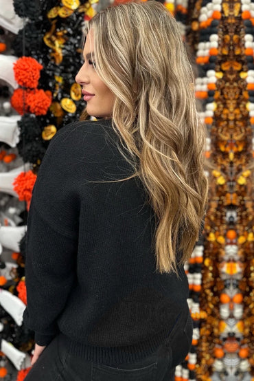 Chic black sequined pumpkin sweater