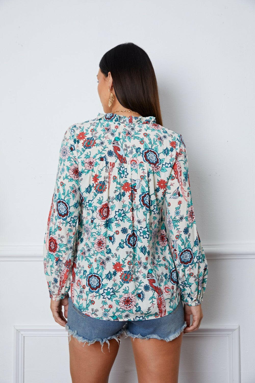 Floral Notched Long Sleeve Blouse.