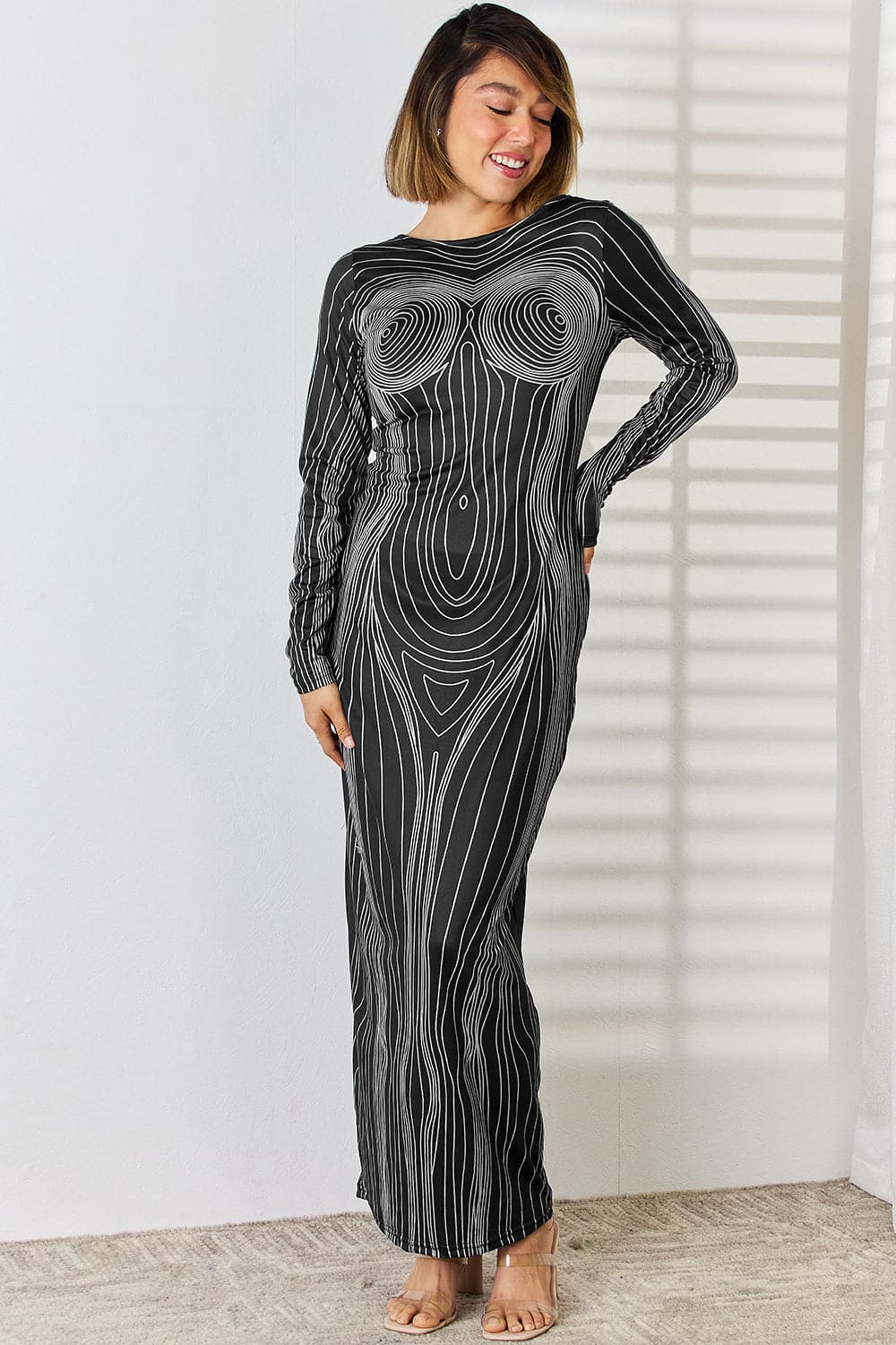 Cutout Round Neck Long Sleeve Maxi Dress.