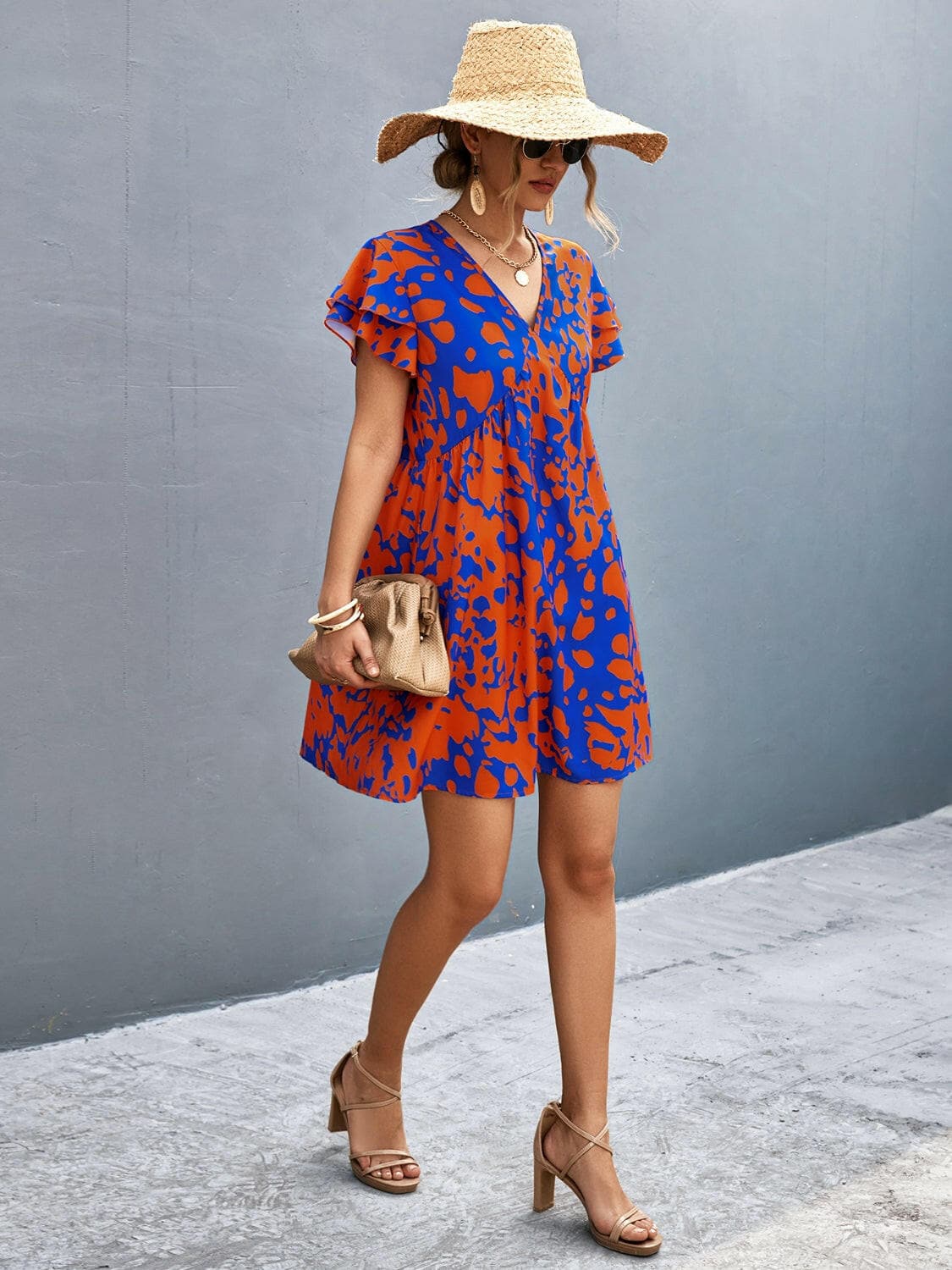 Ruffled Printed V-Neck Short Sleeve Mini DressUpgrade Your Wardrobe with our Ruffled Printed V-Neck Short Sleeve Mini Dress
 Step out in style with our stunning Ruffled Printed V-Neck Short Sleeve Mini Dress. ElLove Salve -Neck Short Sleeve Mini Dress