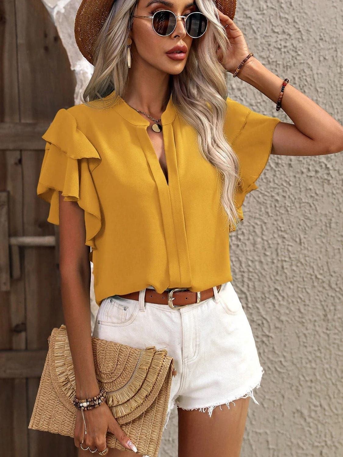 Ruffled Notched Short Sleeve Blouse.