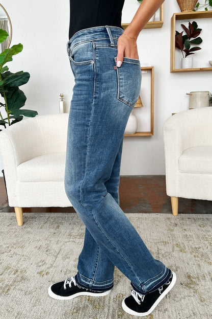 Trendy mid-rise release hem jeans by Judy Blue