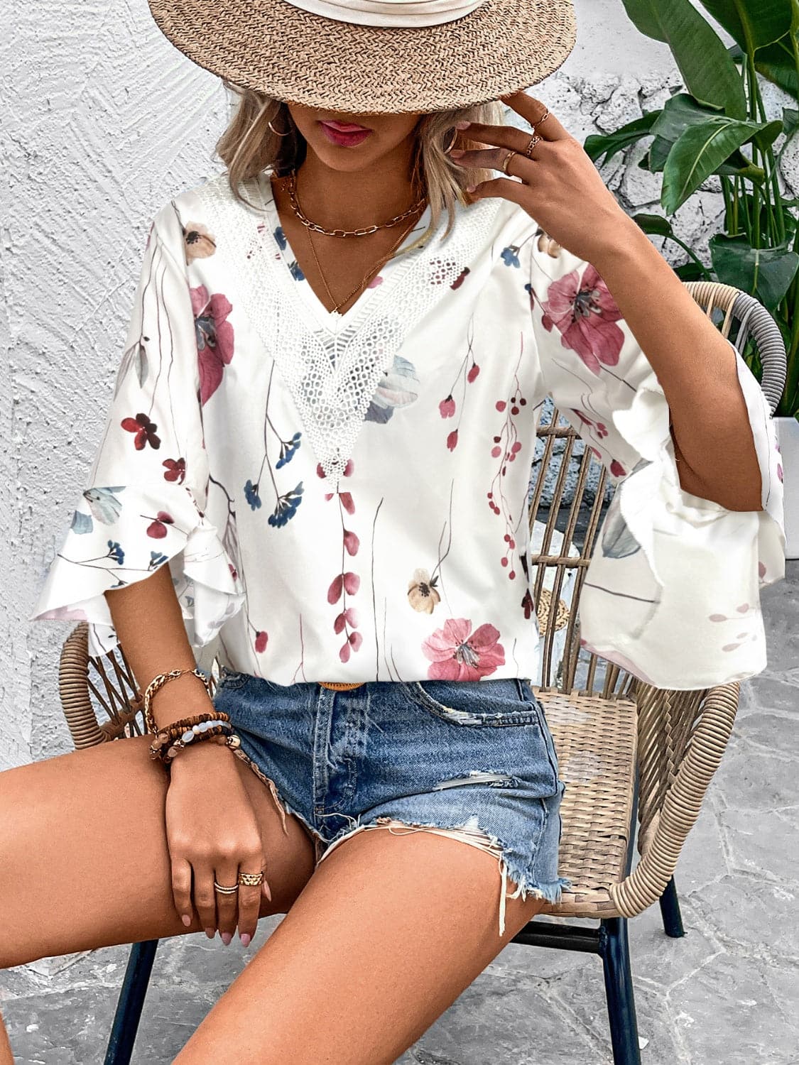 Ruffled Printed V-Neck Half Sleeve Blouse.