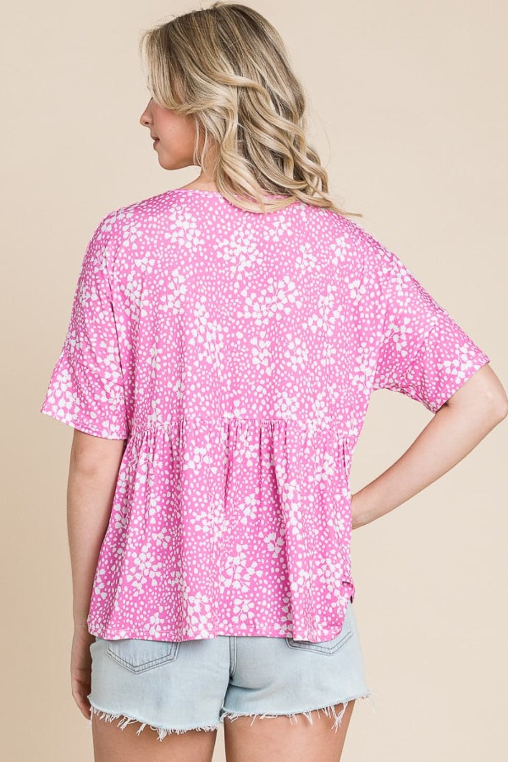 BOMBOM Floral Round Neck Peplum Blouse.