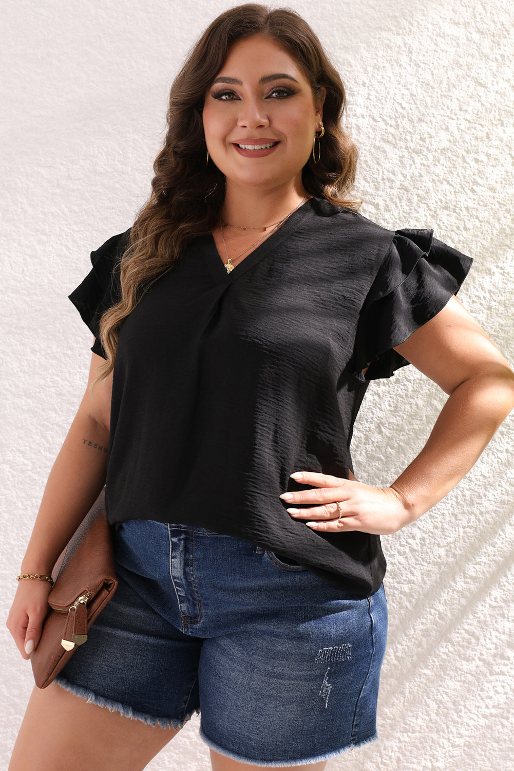 Chic black plus size blouse with ruffled sleeves and v-neck