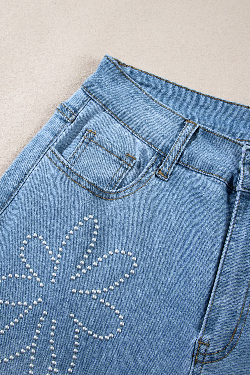 Light blue wide leg jeans with rhinestones