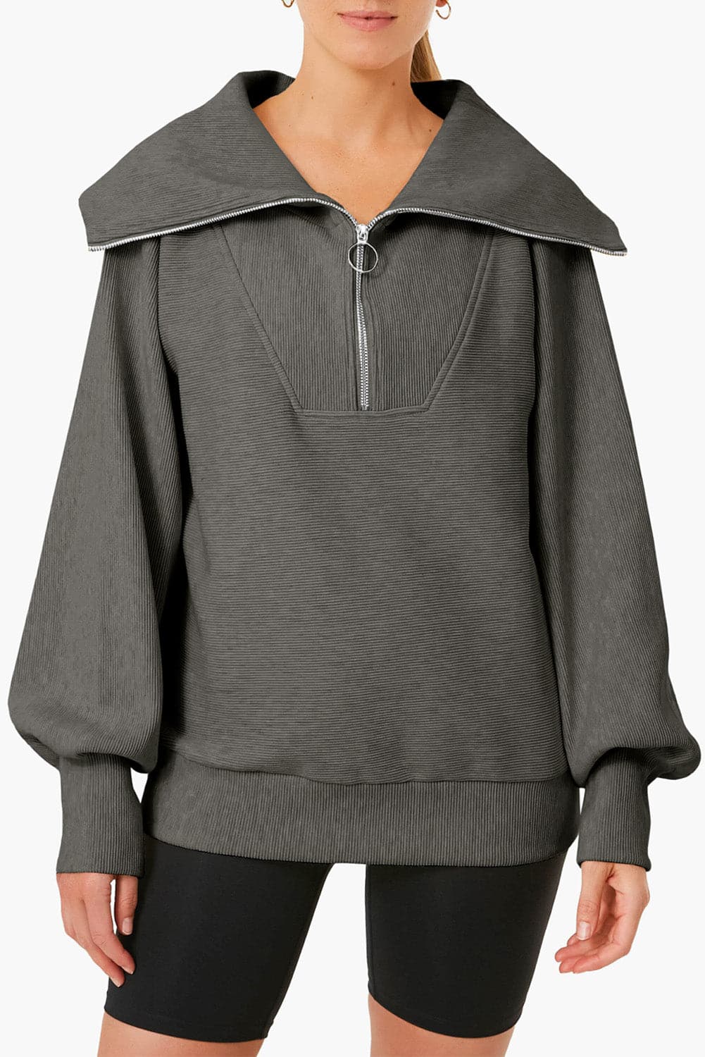 Pocketed Quarter Zip Collared Neck Sweatshirt.