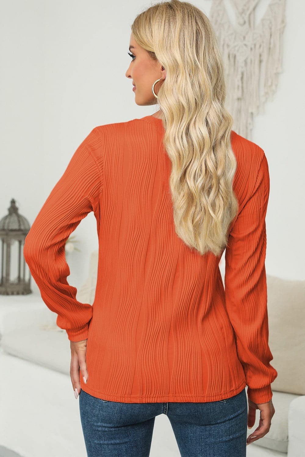 Textured Round Neck Long Sleeve Blouse.