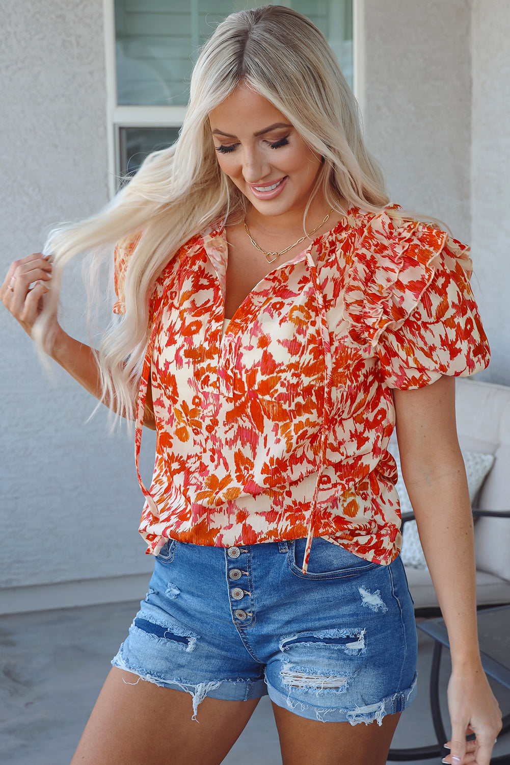 Vibrant Orange Ruffled Floral Blouse with Puff Sleeves and Split Neckline