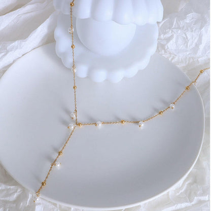 Elegant 18K Gold-Plated Pearl Necklace with Drop Pendant.