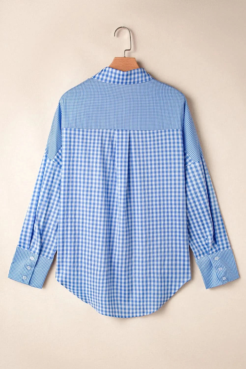 Plaid pocketed long sleeve collared shirt with a touch of stretch