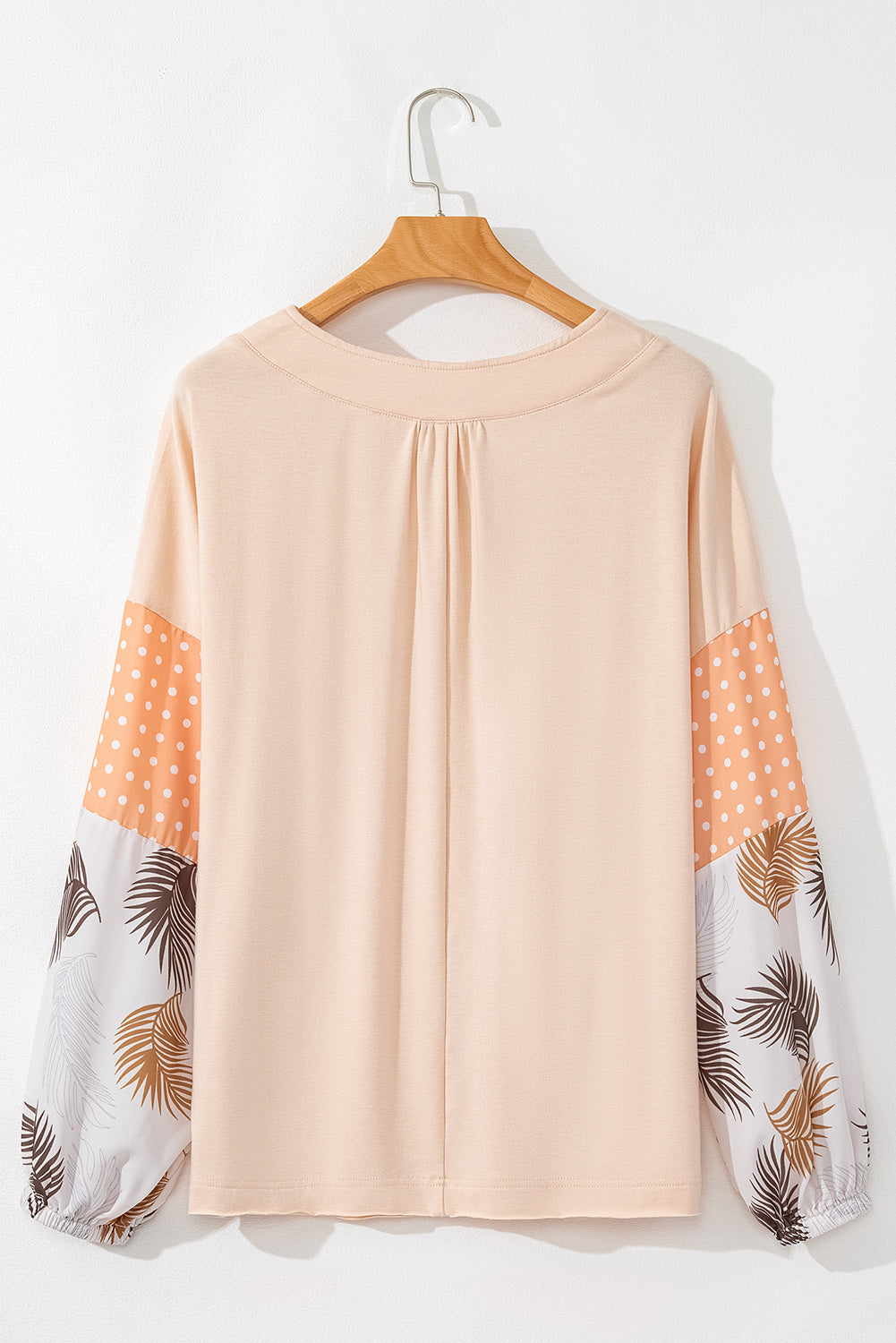 Chic jet stream blouse with palm leaves and polka dot puff sleeves