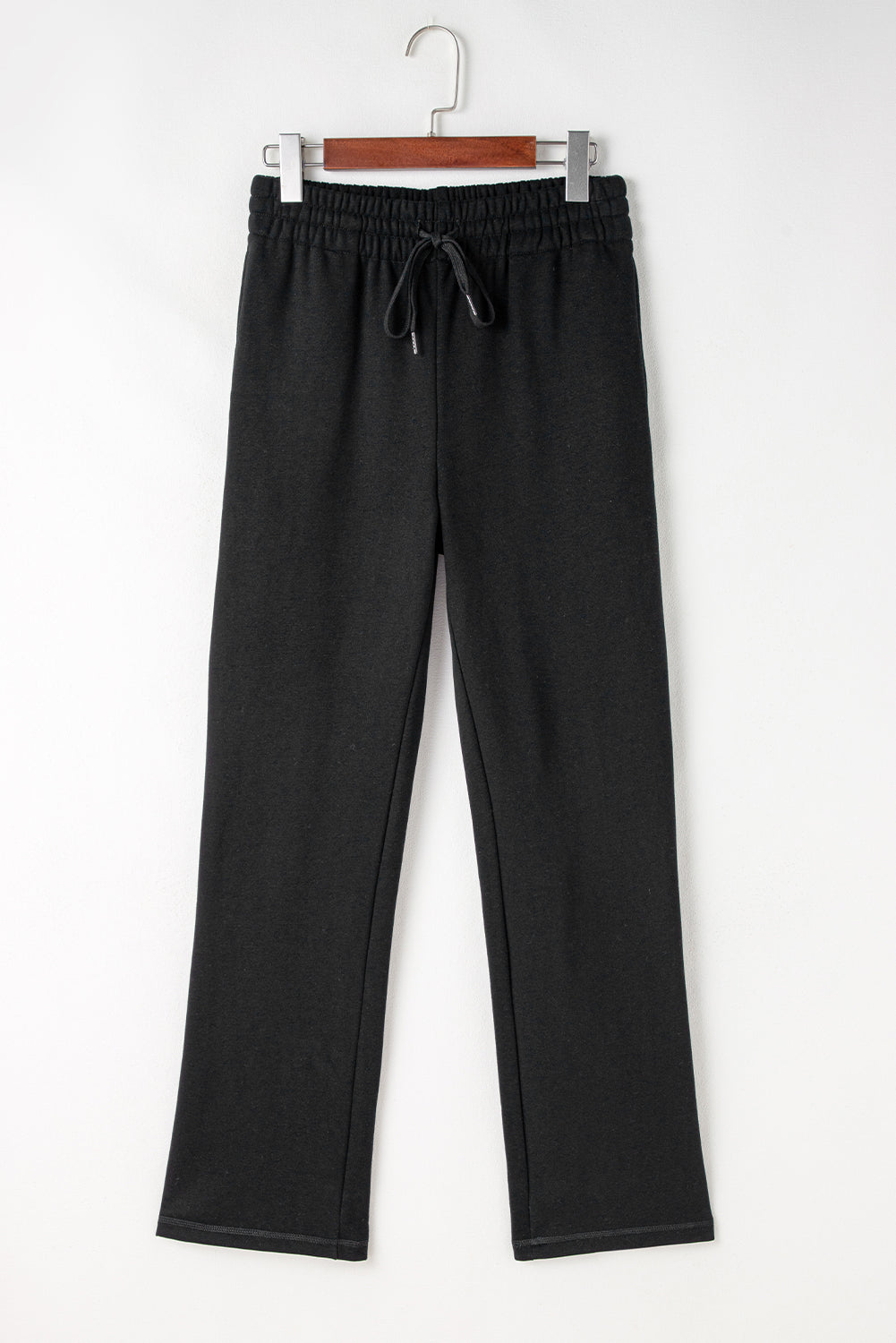 Cozy black fleece-lined casual pants with adjustable drawstring waist