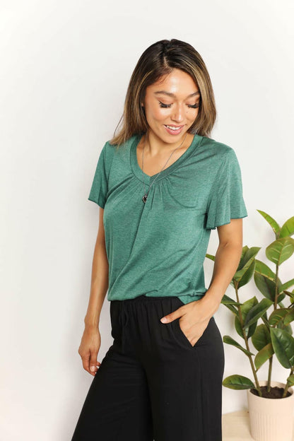 Double Take Ruched V-Neck Short Sleeve T-ShirtDouble Take Ruched V-Neck Short Sleeve T-Shirt
 Discover your new favorite tee! The Double Take Ruched V-Neck Short Sleeve T-Shirt effortlessly combines style and coLove Salve -Neck Short Sleeveplus