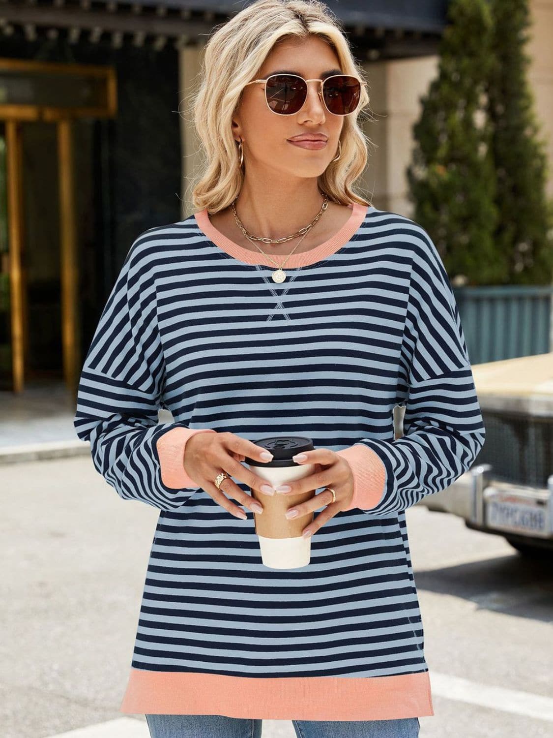 Slit Striped Round Neck Long Sleeve Sweatshirt.