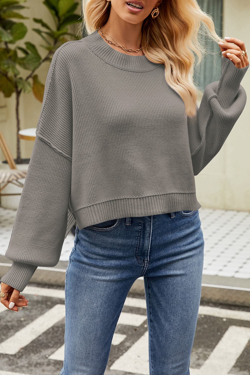 Round Neck Dropped Shoulder Sweater.