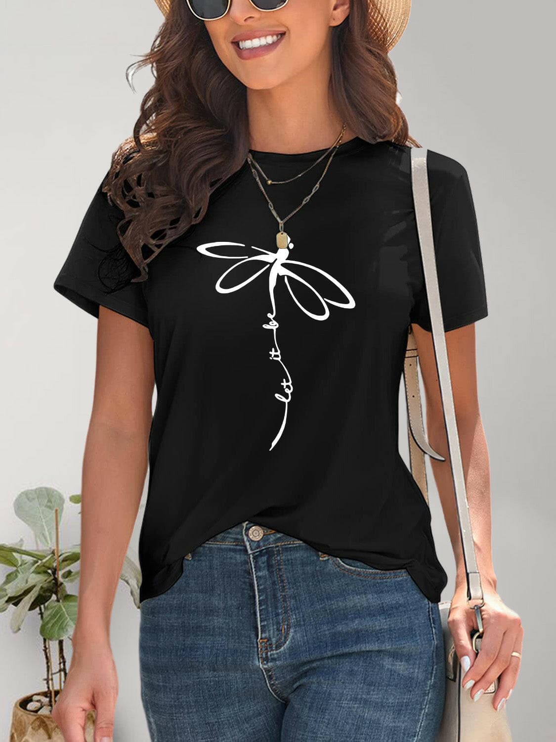 Chic dragonfly graphic tee with round neck and short sleeves.