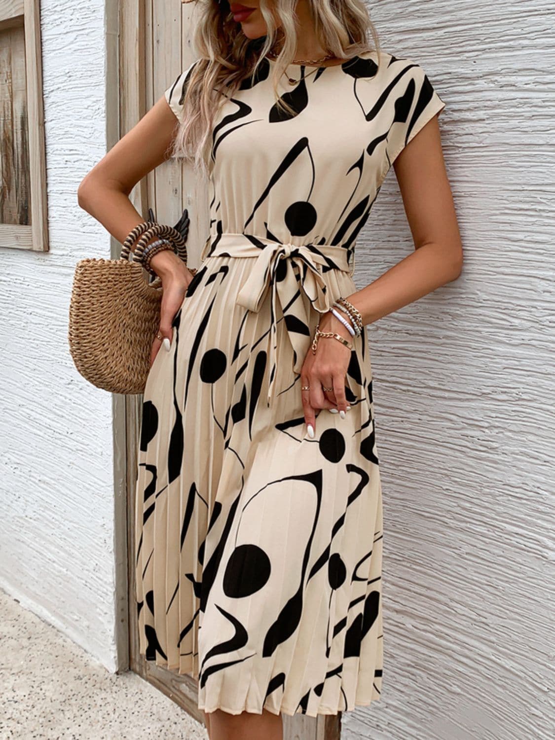 Tied Pleated Printed Cap Sleeve Dress.