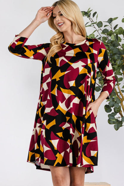 Celeste Full Size Geometric Round Neck Dress with Pockets.