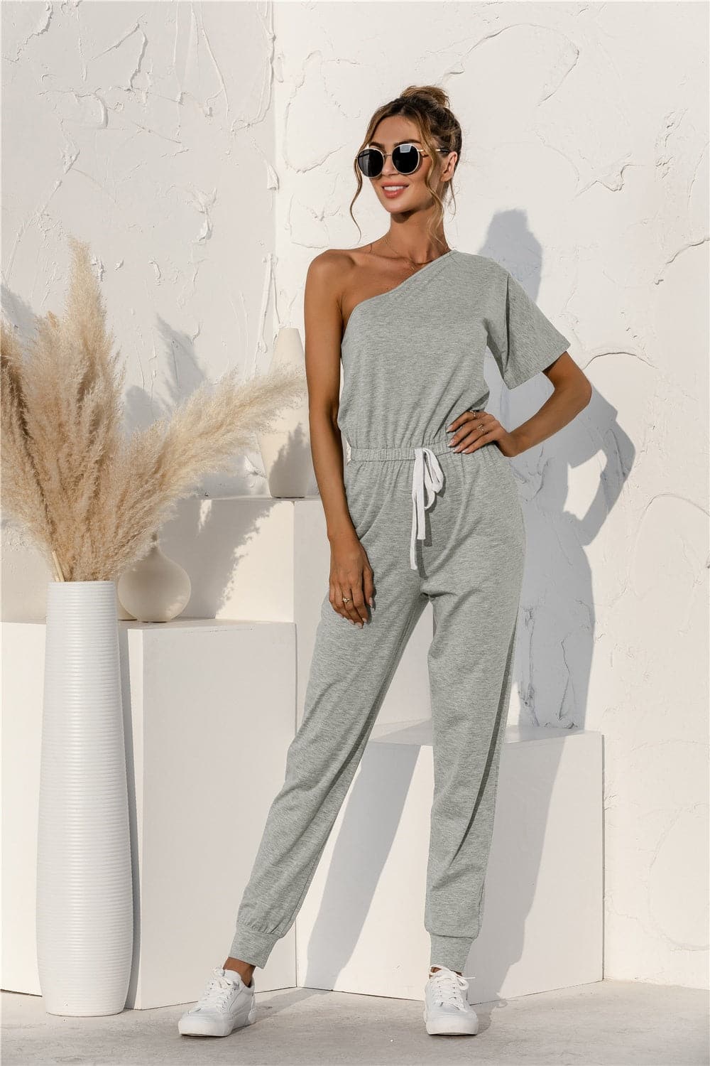 Single Shoulder Short Sleeve Jumpsuit.