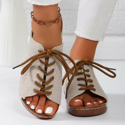 Lace-Up Open Toe Wedge SandalsStep Up Your Style with Lace-Up Open Toe Wedge Sandals
 Indulge in fashion-forward comfort with our Lace-Up Open Toe Wedge Sandals. Elevate your look with these stylLove Salve Open Toe Wedge Sandalsjust arrived