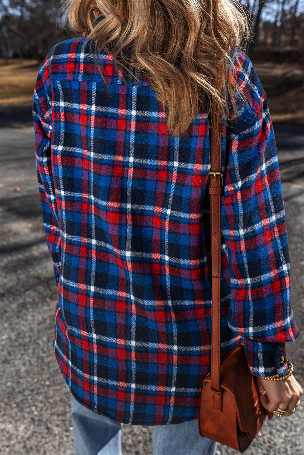 Navy plaid button-up shacket with flap pockets