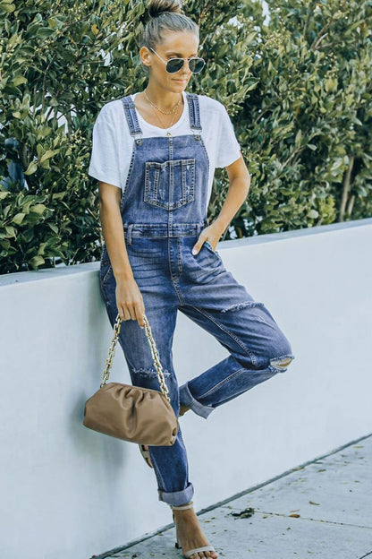 Pocketed Distressed Denim Overalls.