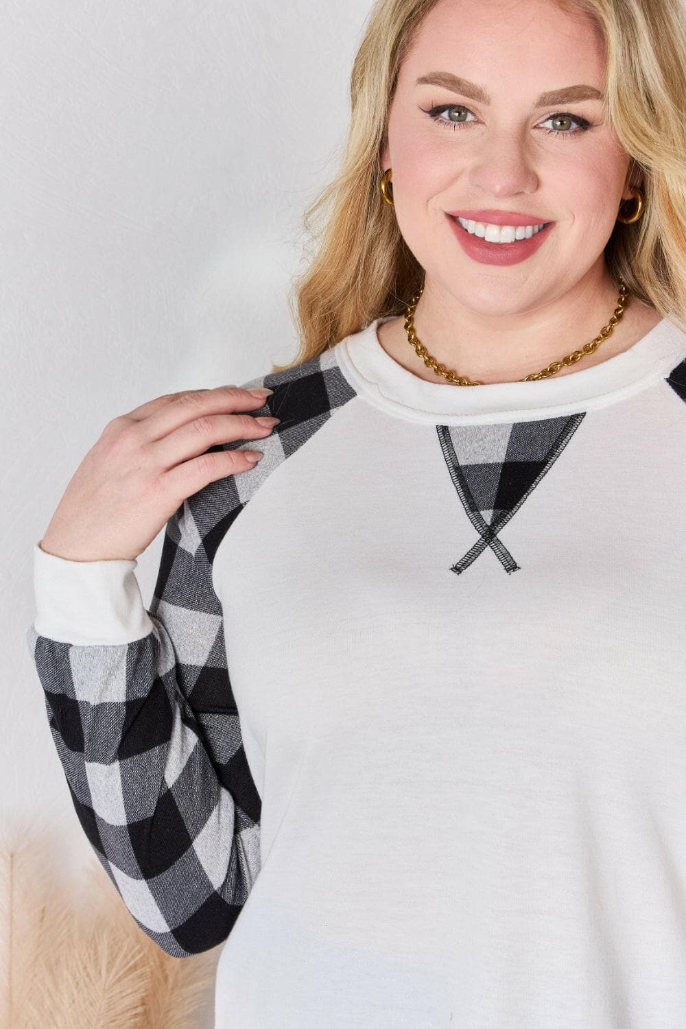 Hailey & Co Full Size Plaid Raglan Sleeve Round Neck BlouseUpgrade Your Style with Hailey &amp; Co Plaid Raglan Sleeve Blouse
 Revamp your wardrobe with our Full Size Plaid Raglan Sleeve Round Neck Blouse by Hailey &amp; Co.Love Salve Full Size Plaid Raglan Sleeve Round Neck BlouseBlouses