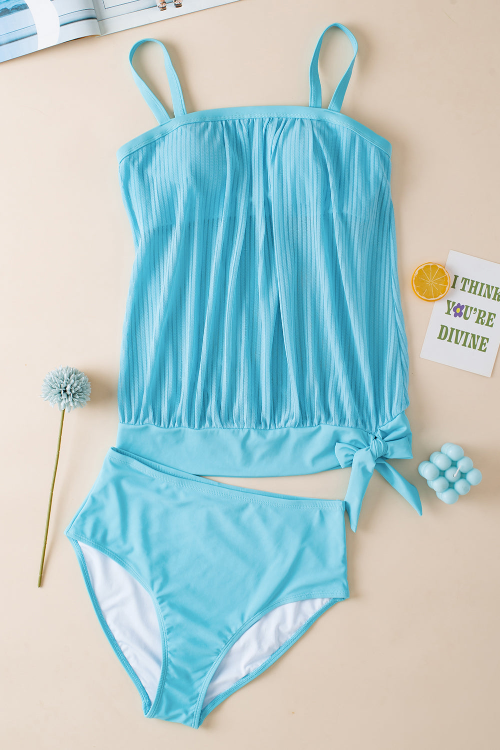 Turquoise striped mesh swim top with knotted hem detail