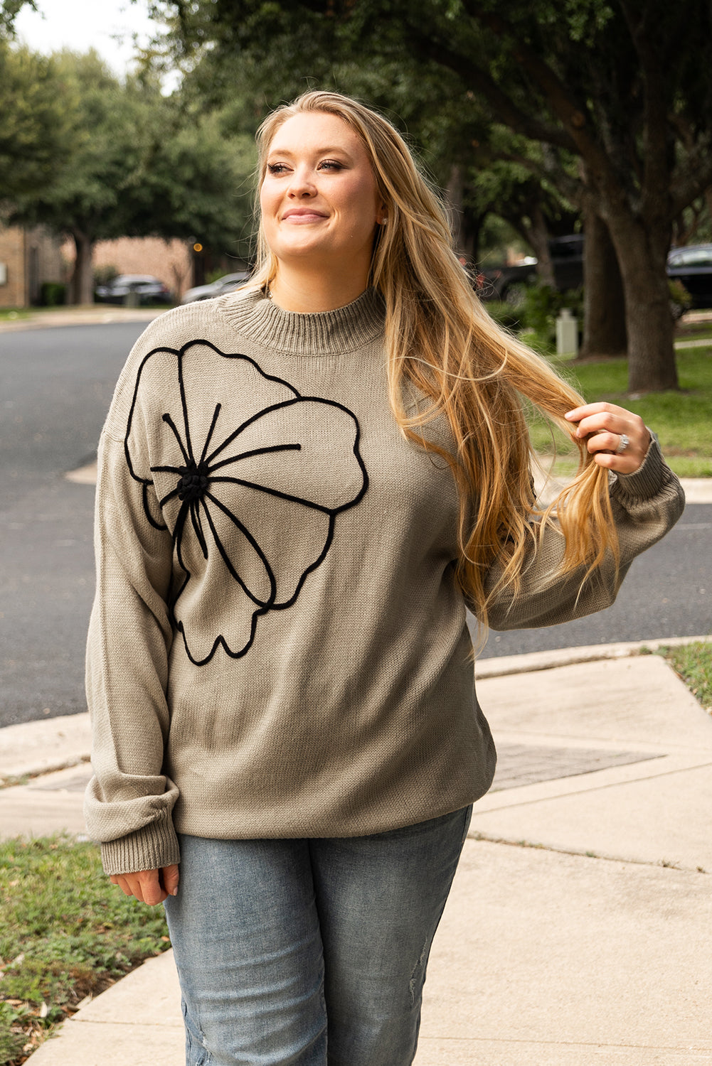 Chic dark khaki plus size sweater with vibrant flower pattern and high neck design